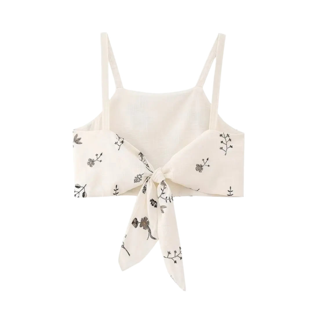 Outfit de verano con falda y top corto estampado sin mangas y falda línea A con cordón