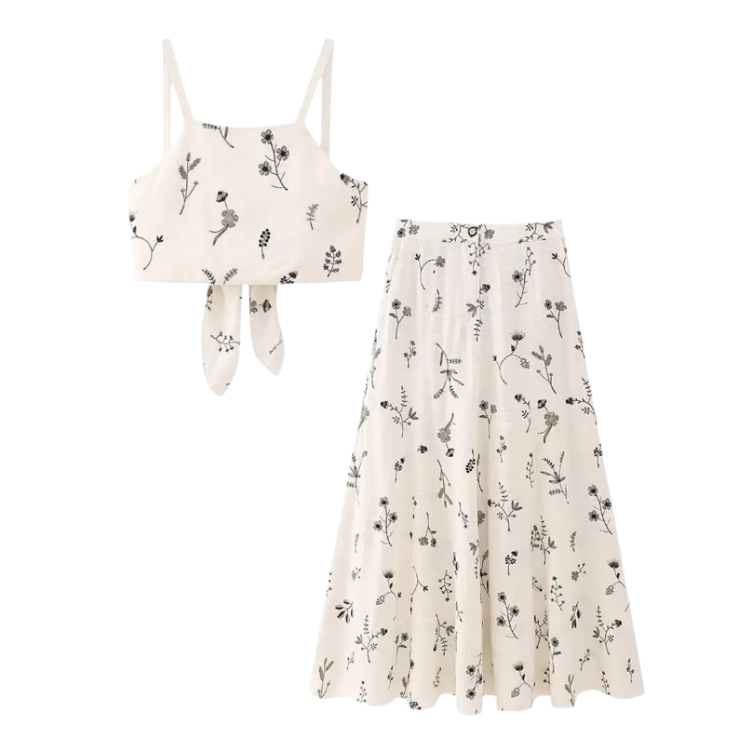 Outfit de verano con falda y top corto estampado sin mangas y falda línea A con cordón