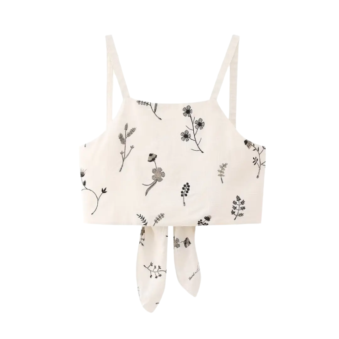 Outfit de verano con falda y top corto estampado sin mangas y falda línea A con cordón