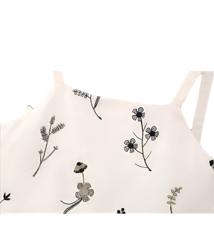 Summer outfit with sleeveless printed crop top and skirt and A-line skirt with drawstring 