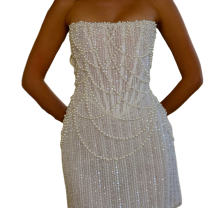 Sleeveless and strapless short evening dress with white pearls and open back