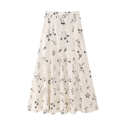 Summer outfit with sleeveless printed crop top and skirt and A-line skirt with drawstring 