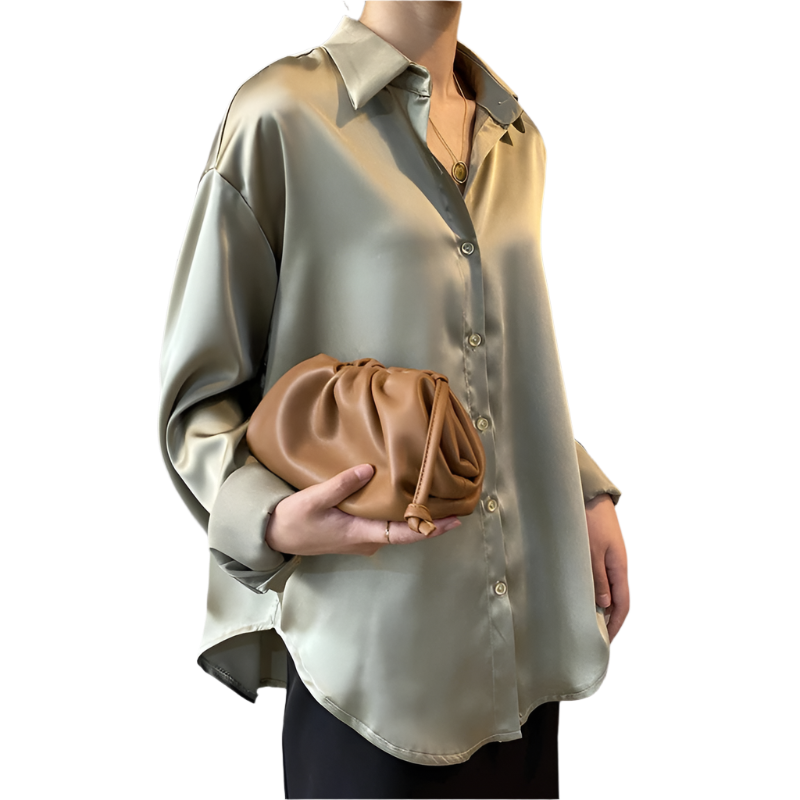 Women's vintage style white blouse with long sleeves and loose button design