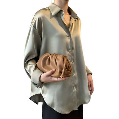 Women's vintage style white blouse with long sleeves and loose button design
