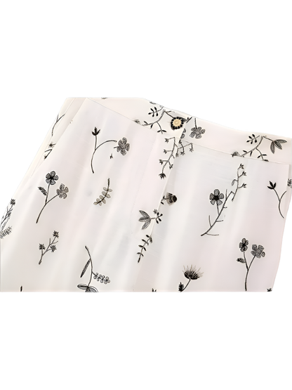 Summer outfit with sleeveless printed crop top and skirt and A-line skirt with drawstring 