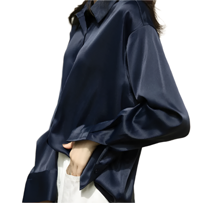 Women's vintage style white blouse with long sleeves and loose button design