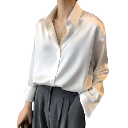 Women's vintage style white blouse with long sleeves and loose button design