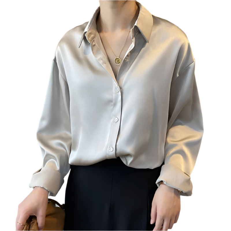 Women's vintage style white blouse with long sleeves and loose button design