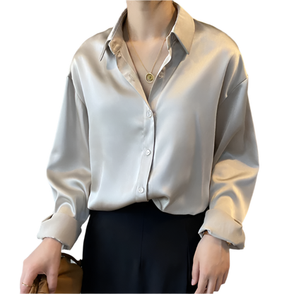 Women's vintage style white blouse with long sleeves and loose button design